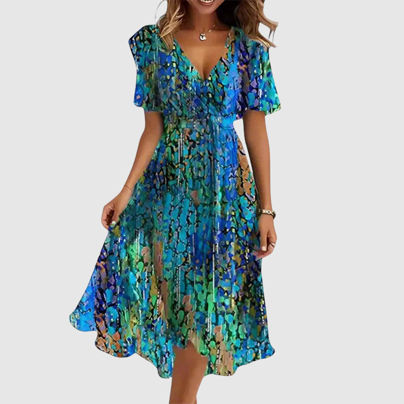 Attraktives Damen Blumen Midikleid mit V-Ausschnitt und kurzen Ärmeln. Perfektes Sommerkleid für jeden Tag.