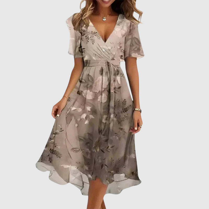 Elegantes Damen Midikleid mit Blumenmuster & V-Ausschnitt. Bequemes Freizeitkleid, ideal für Frühling/Sommer.
