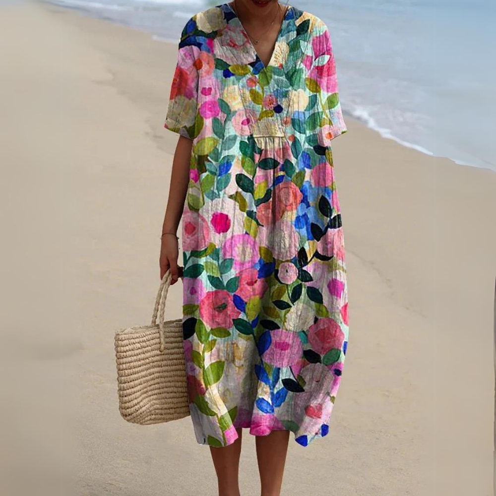 Leichtes Damen Sommerkleid mit Blumenmuster. Fließend, V-Ausschnitt, perfekt für Urlaub & Strand.
