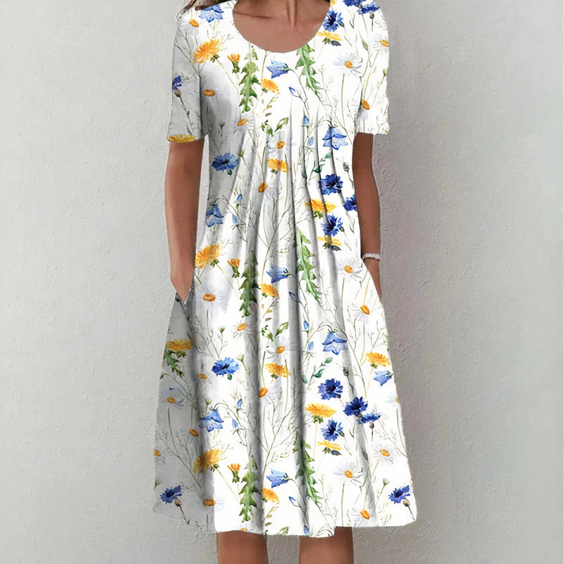 Gemütliches Midikleid für Damen, locker geschnitten, ideal als Freizeitkleid oder Sommerkleid mit Blumenmuster.