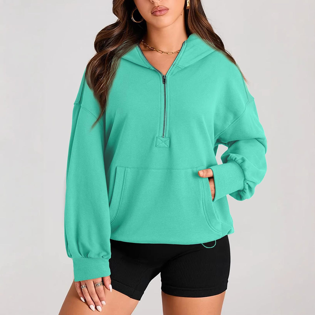 Komfortabler Damen Oversize-Halbzip-Hoodie mit Kapuze, Tunnelzug & Kängurutasche für entspannte Tage.