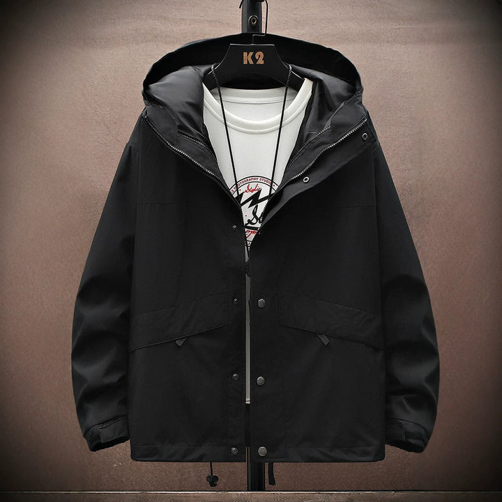 Leichte Herren Wanderjacke, atmungsaktiv und komfortabel, mit praktischer Kapuze für jedes Wetter.