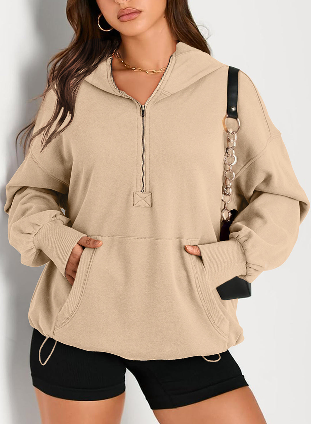 Stylischer Damen Oversize-Halbzip-Hoodie mit Kapuze, verstellbarem Tunnelzug & Kängurutasche.