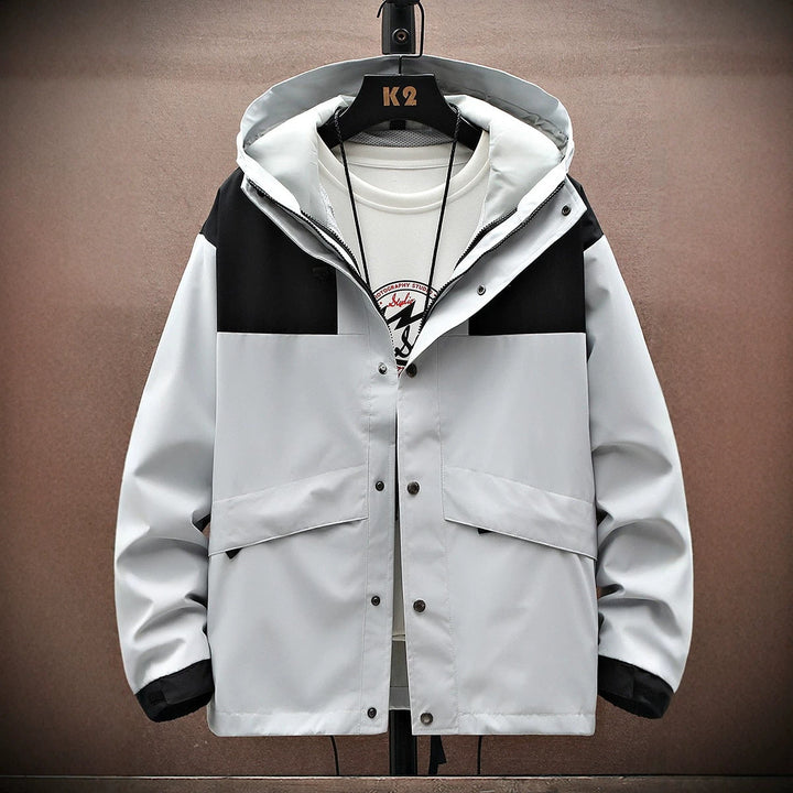 Vielseitige Herren Übergangsjacke mit Kapuze, ideal für Sport, Outdoor und den Alltag.