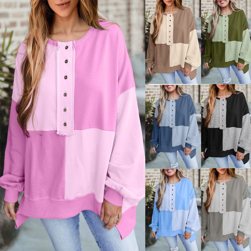 Damen Oversize-Sweatshirt mit Colorblock, Henley-Knopfleiste und Ballonärmeln für einen lässigen Look.