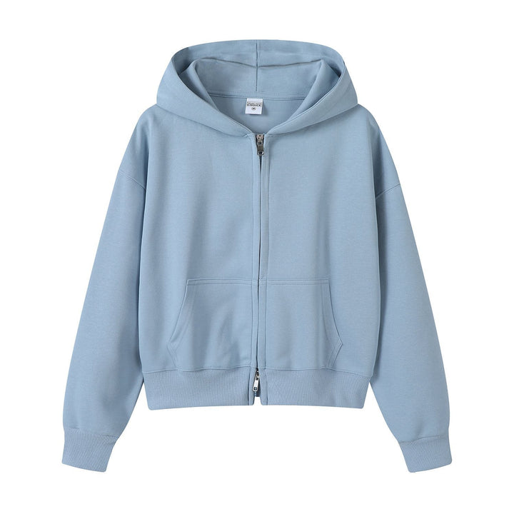 Detailaufnahme des weichen Stoffes der Damen Hoodie Jacke mit Kapuze und Reißverschluss.