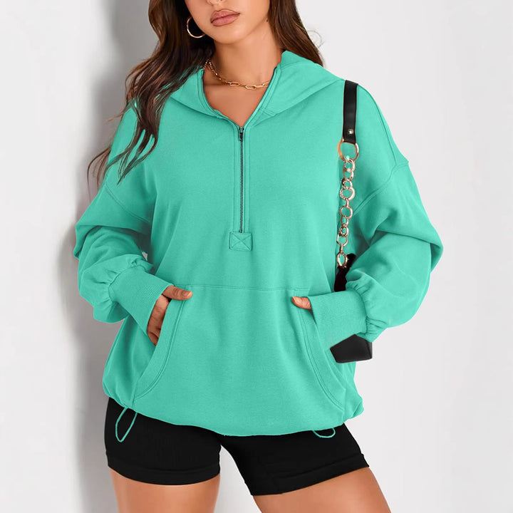 Sportlicher Damen Kapuzenpullover, Oversize, mit Halbzip, Tunnelzug & praktischer Kängurutasche.