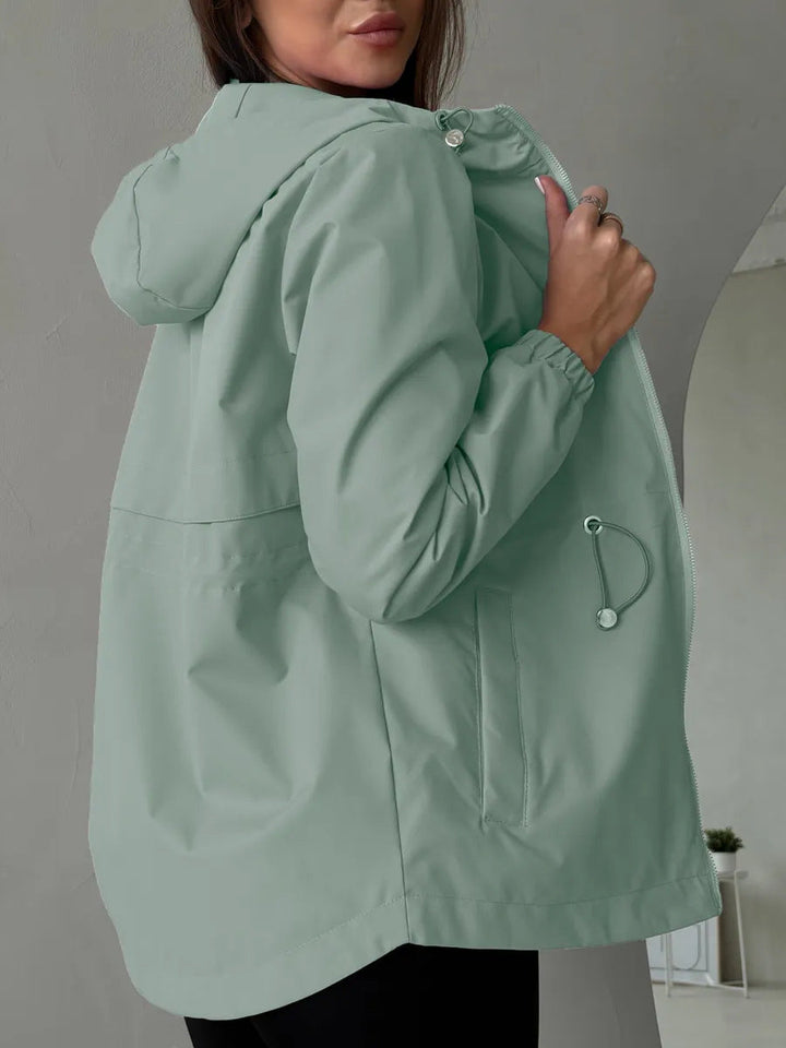 Bequeme Damen Kapuzen-Sportjacke, leicht und winddicht, perfekt für Outdoor und Freizeit.