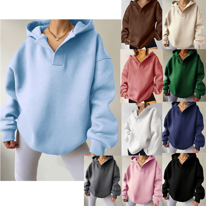 Damen Oversize Kapuzenpullover mit V-Ausschnitt. Lässiger, moderner Look für Herbst & Winter.