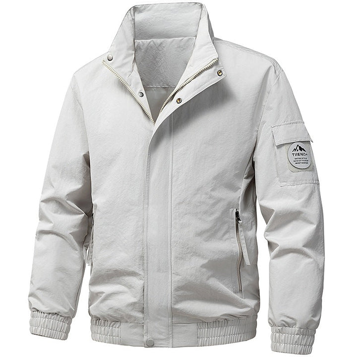 Robuste Herren-Windjacke schützt vor Wind und Wetter beim Wandern, Laufen und im Alltag.