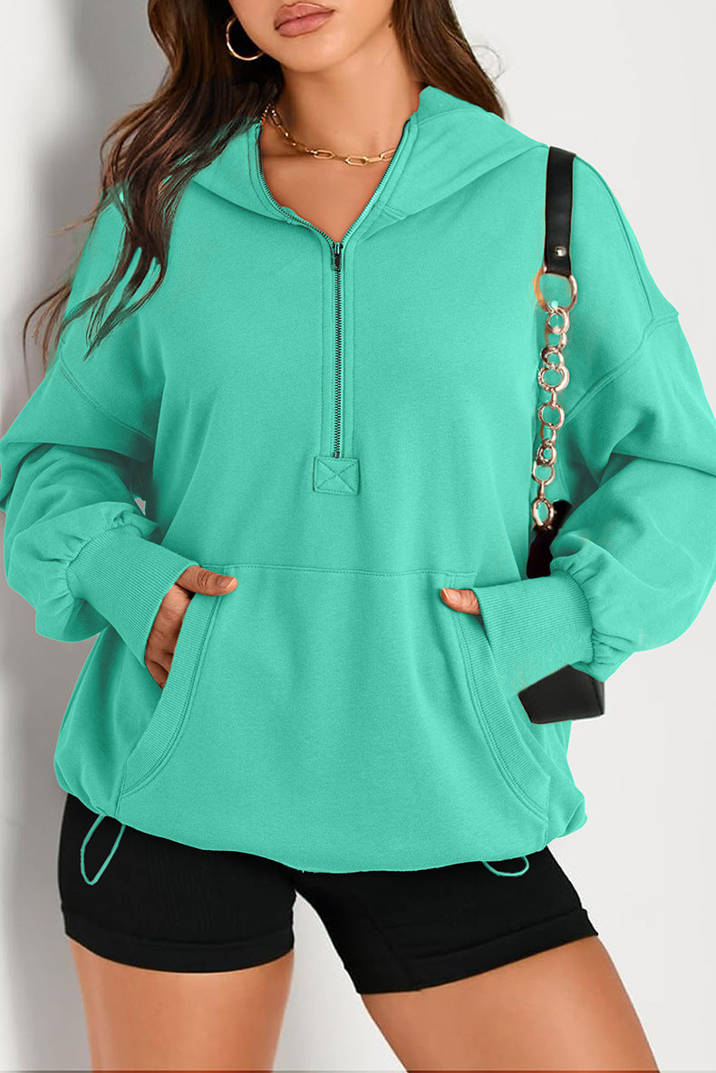 Bequemer Damen Kapuzenpullover, Oversize, mit Halbzip, Tunnelzug & Kängurutasche für den lässigen Look.