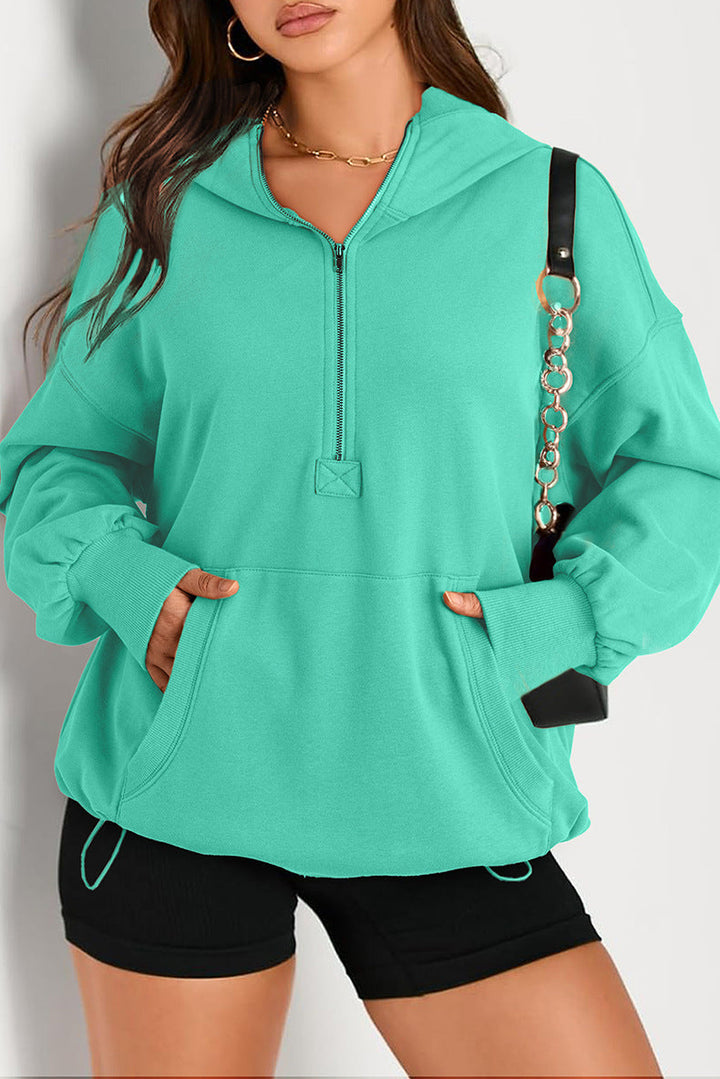 Bequemer Damen Kapuzenpullover, Oversize, mit Halbzip, Tunnelzug & Kängurutasche für den lässigen Look.