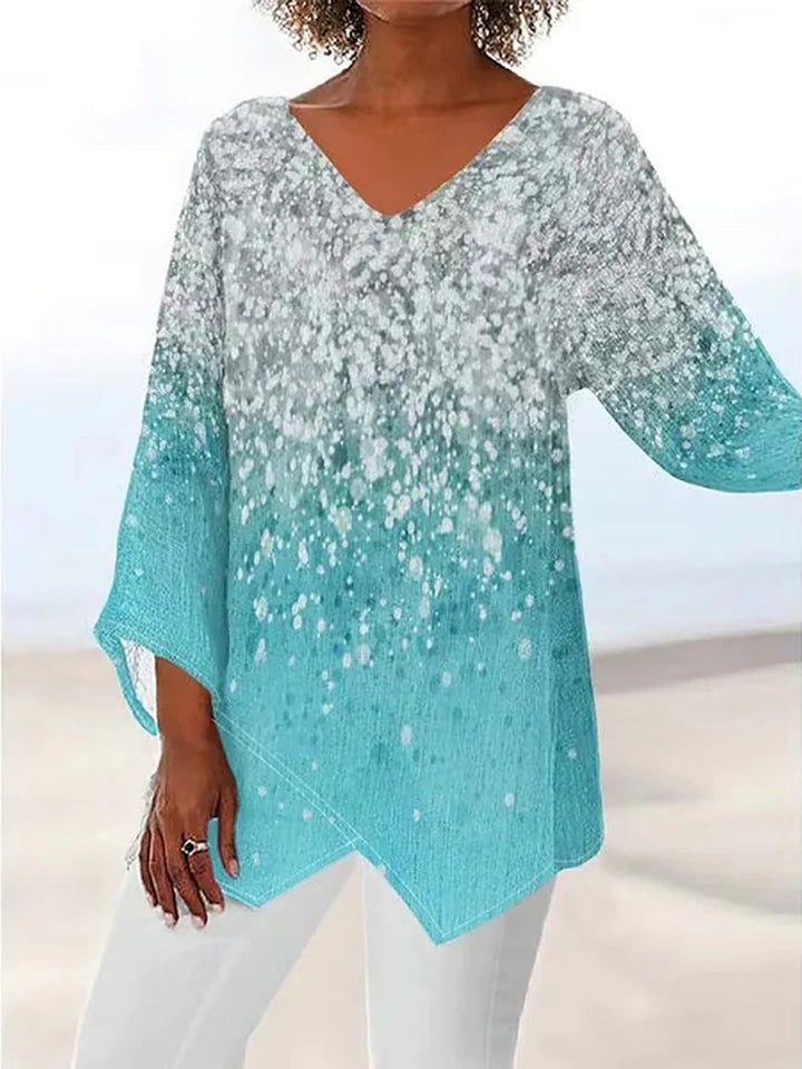 Detailaufnahme der glitzernden Damen Tunika Bluse, eleganter Stoff, perfekt für festliche Outfits.