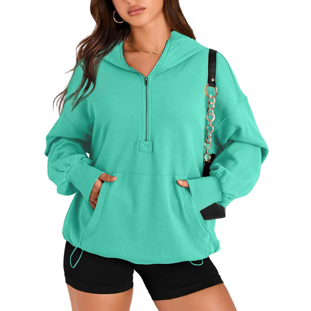 Lässiger Damen Oversize-Hoodie mit Halbzip, Kapuze & Kängurutasche. Ideal für Streetwear & Athleisure.
