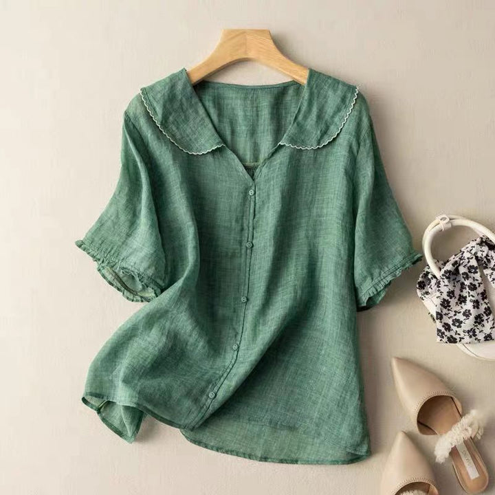 Elegante Damen Kurzarm-Bluse mit Wellenkragen, locker geschnitten für Komfort und modischen Stil in Freizeit & Büro.
