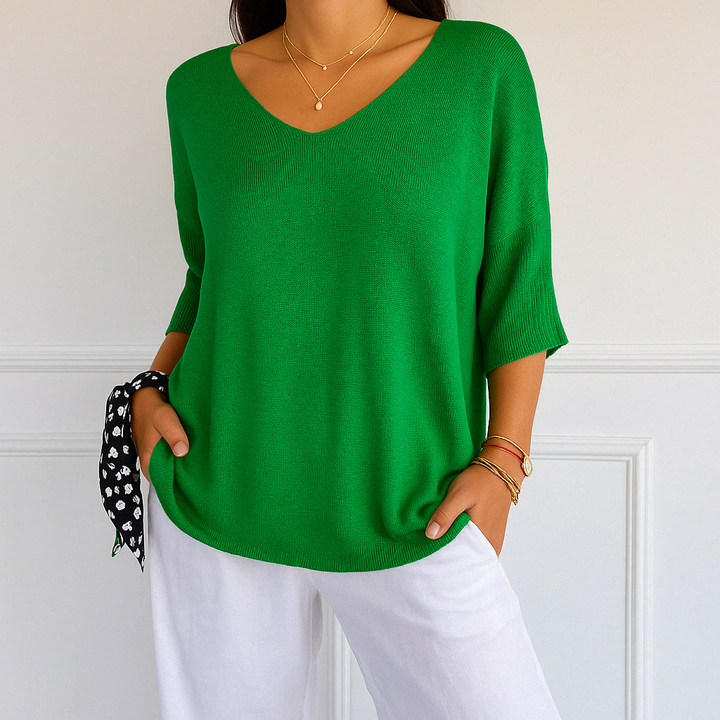 Schicker Damen Kurzarm-Pullover mit V-Ausschnitt. Lässiger Schnitt, schmeichelhaft und perfekt für den Übergang.