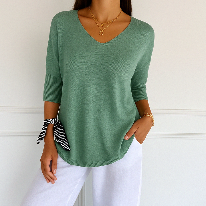 Vielseitiger Damen Sweater mit V-Ausschnitt und kurzen Ärmeln. Lockerer Stil für jede Figur, ideal für Frühling.