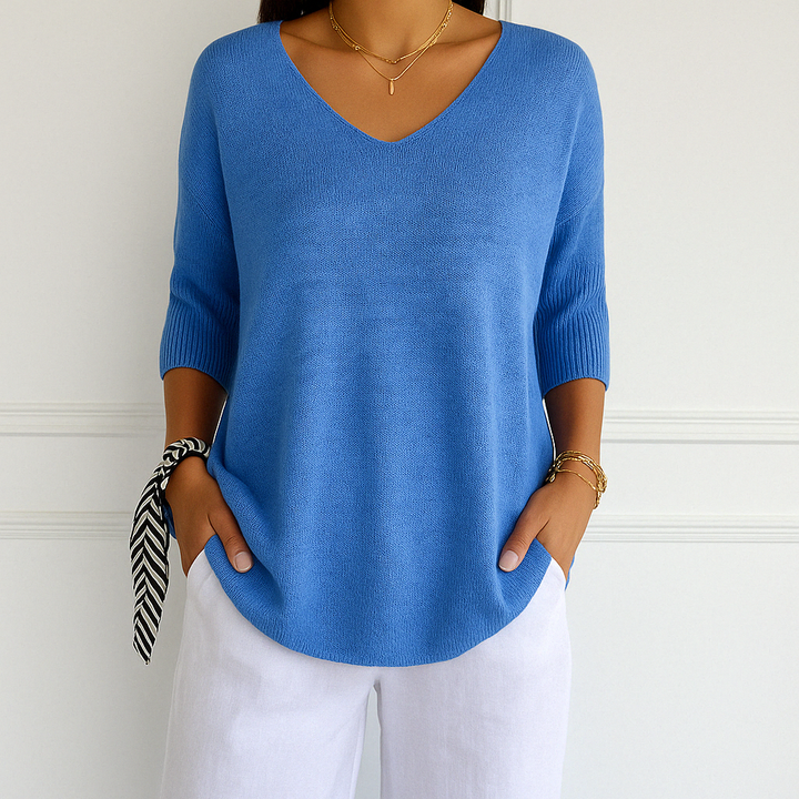 Frühlingshafter Damen Pullover mit kurzen Ärmeln. Lockerer V-Ausschnitt, bequem und stilvoll für den Alltag.