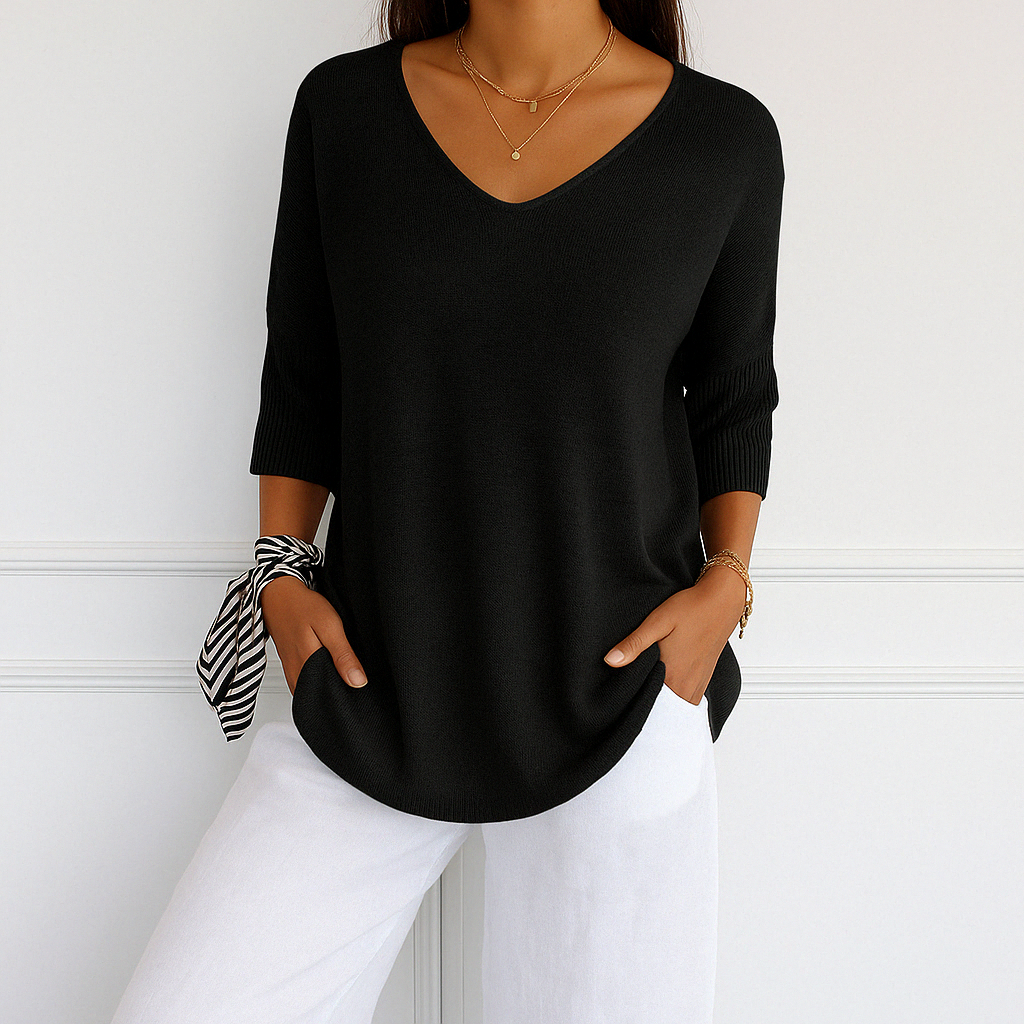 Lockerer Damen Pullover mit V-Ausschnitt und kurzen Ärmeln. Komfortabler und vielseitiger Stil für Freizeit.