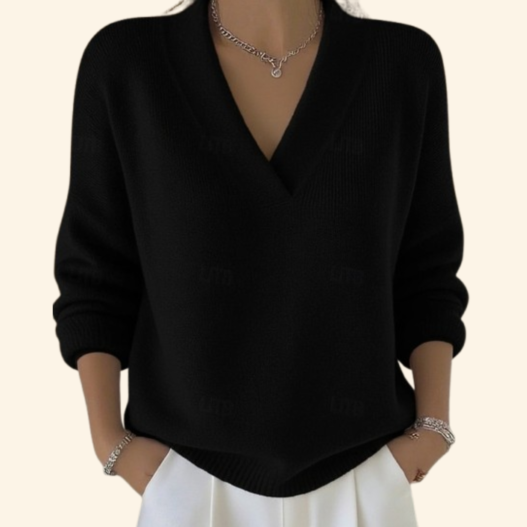Zeitloser roter Damen Pullover mit V-Ausschnitt. Kuscheliges, langärmliges Winter-Oberteil mit lockerer Passform.