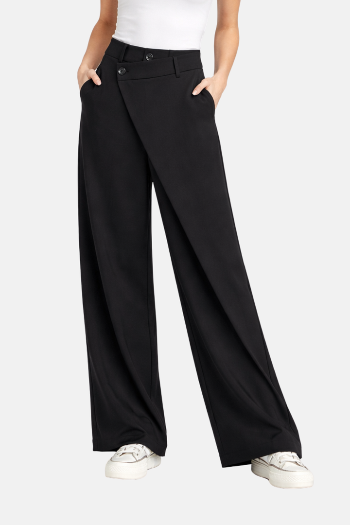 Modische Damen Baggy-Hose mit asymmetrischer Taille, urbaner Style, schwarz. Weit geschnittene Freizeithose.