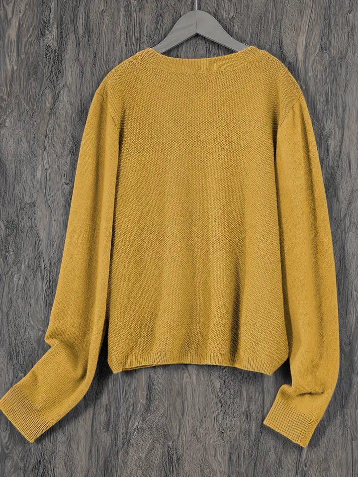 Offen getragene Damen Strickjacke, locker geschnitten, bequemer Fall, modisch für flexible Layering-Looks.