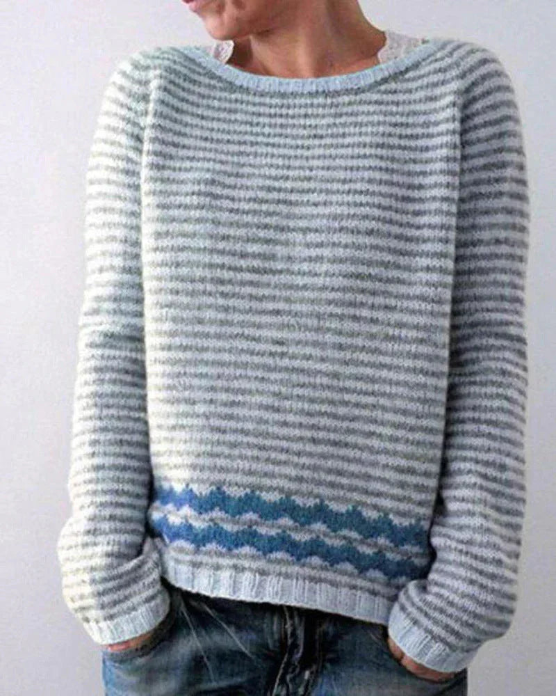 Gemütlicher Damen-Strickpullover, Weihnachtspullover mit nordischem Muster. Warme Festtagskleidung für den Winter.