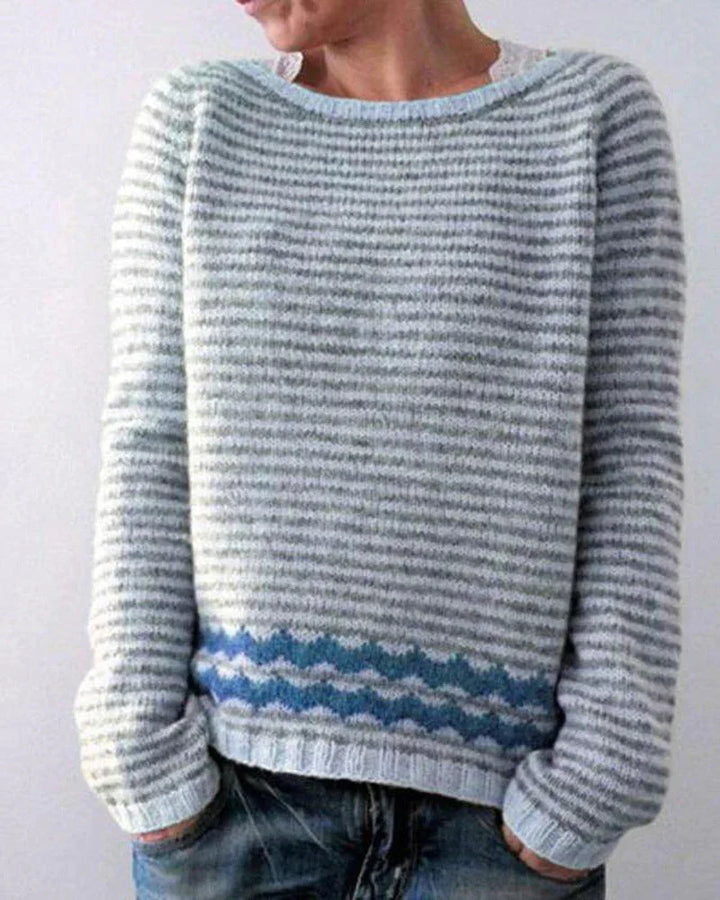 Gemütlicher Damen-Strickpullover, Weihnachtspullover mit nordischem Muster. Warme Festtagskleidung für den Winter.