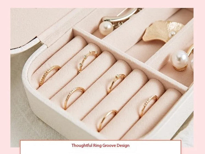 Stilvolle Reise-Schmuckschatulle aus Leder, doppellagig. Organisator für Ketten, Ohrringe und Armbänder.