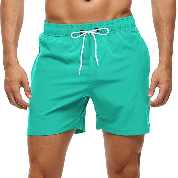 Detailansicht der Herren Badehose: Kordelzug, Regular Fit und praktische Reißverschlusstasche.