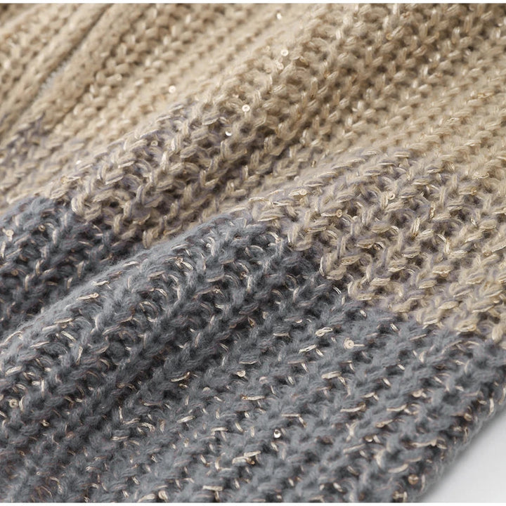 Modische Damenstrickjacke mit Glitzer, perfekt als warme Herbstmode für den Alltag.