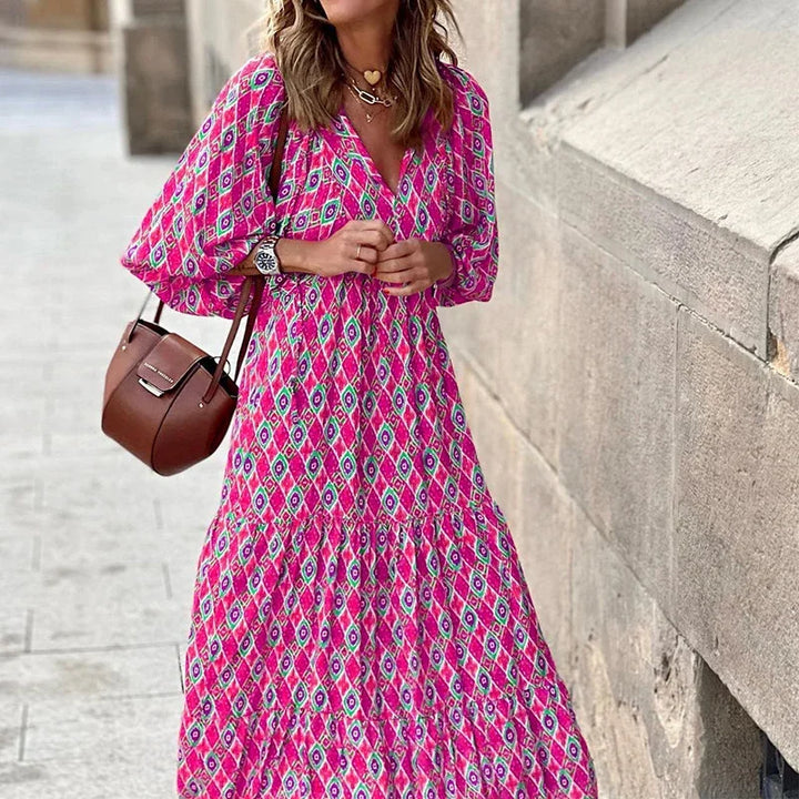 Damen Boho Maxikleid, geblümt, mit eleganten Rüschen und V-Ausschnitt, perfekt als luftiges Sommer-Freizeitkleid.