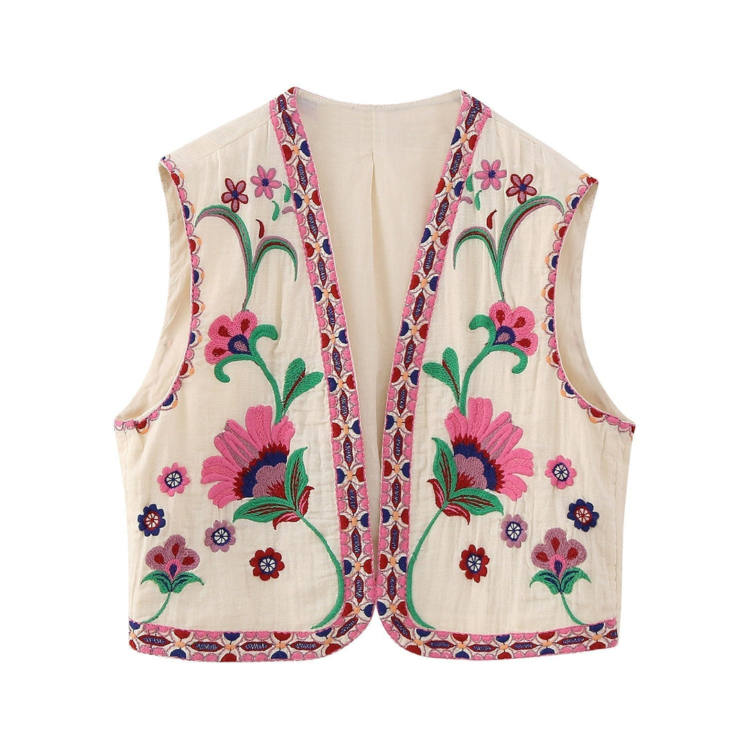 Damen Vintage Weste mit kunstvoller Blumenstickerei, strahlend in Rosa & Blau, für einen eleganten Frühlingslook.
