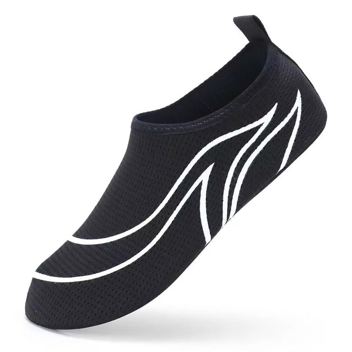 Moderne Unisex Wasserschuhe mit flexibler Sohle, schnelltrocknend & rutschfest für besten Komfort am Strand.