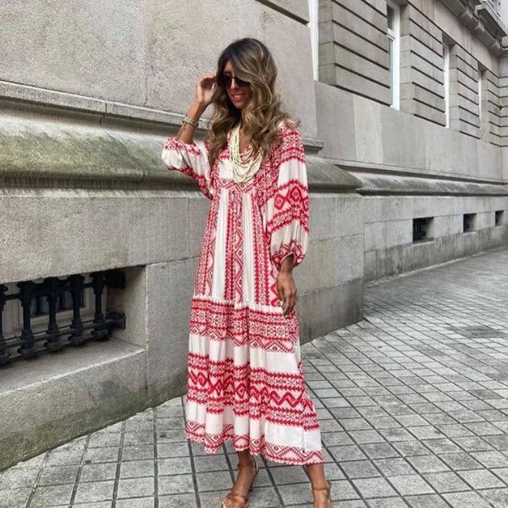 Modisches Damen Maxikleid, geblümt, mit Rüschen, V-Ausschnitt und Puffärmeln, feminin und auch in Plus Size erhältlich.