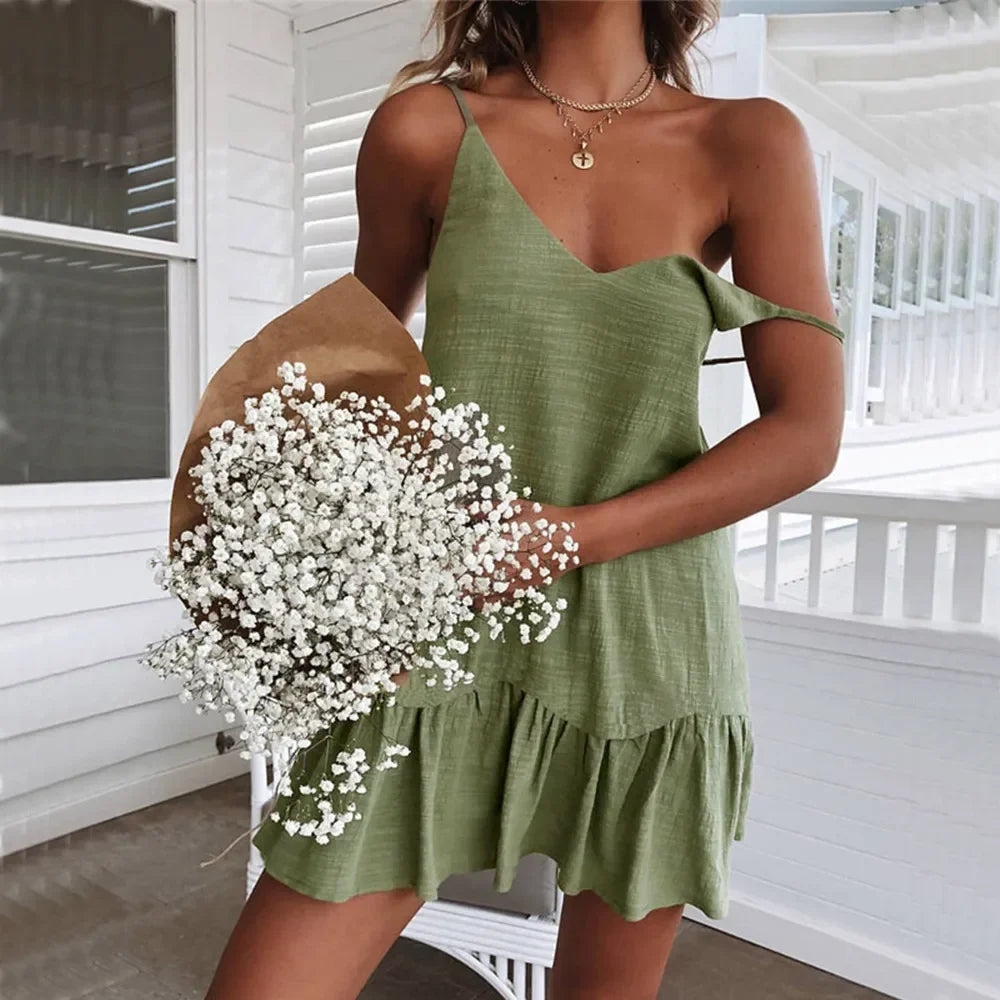 Modisches Jolina Damen Minikleid mit Rüschensaum und Spaghettiträgern. Ein verspieltes Freizeitkleid für den Sommer.