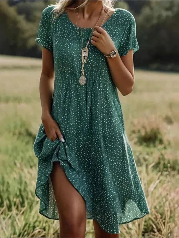 Bequemes Damen Midikleid mit Blumenmuster, lockeres Kurzarm Freizeitkleid, perfekt für warme Frühlingstage.