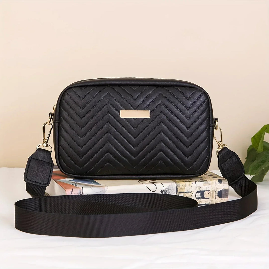 Elegante Damen Handtasche aus schwarzem Kunstleder mit verstellbarem Gurt, ideal für den Alltag.