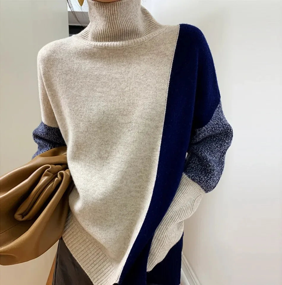 Damen Rollkragenpullover in zweifarbigem Design. Langarm, locker sitzend, bequem und modisch für den Herbst.