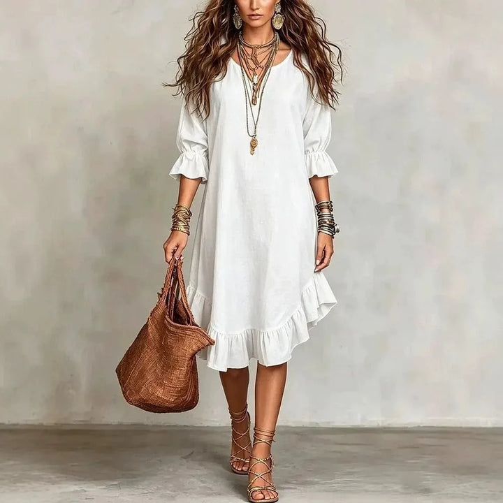Sommerliches Damen Rüschen Midikleid im A-Linien-Schnitt mit V-Ausschnitt. Elegant und luftig für warme Tage.