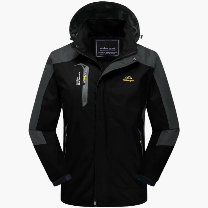 Frau trägt wind- & wasserdichte Damen Funktionsjacke beim Wandern in den Bergen. Atmungsaktiv & bequem.