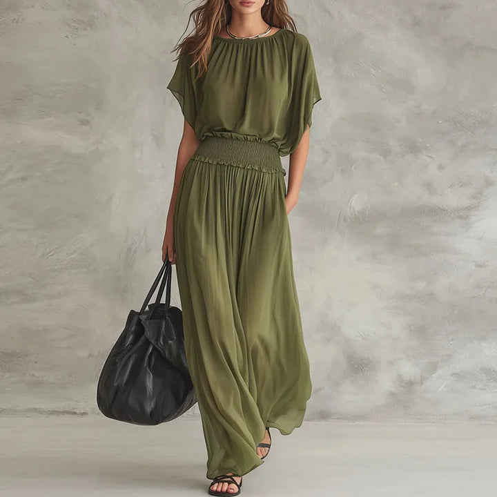 Bequemes Damen Maxikleid, sommerliches Kleid mit geraffter Taille und fließendem Stoff für modische Auftritte.