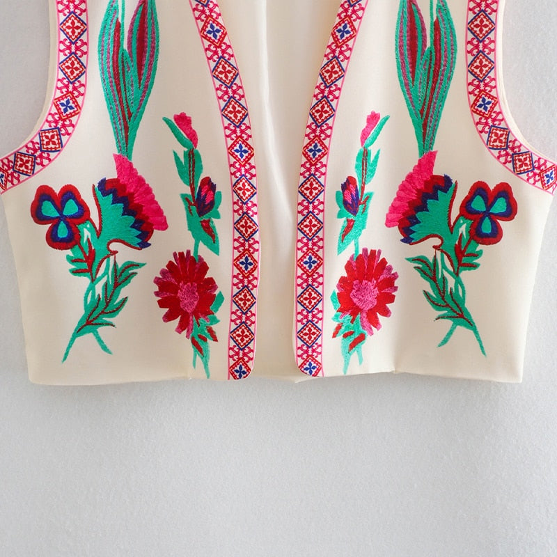 Stilvolle Damen Weste im Vintage-Design mit zarter Blumenstickerei, ideal für einen einzigartigen Sommerlook.
