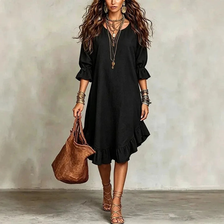 Feminines, fließendes Damen Midikleid mit eleganten Rüschen und schmeichelhaftem V-Ausschnitt. Komfortabel.