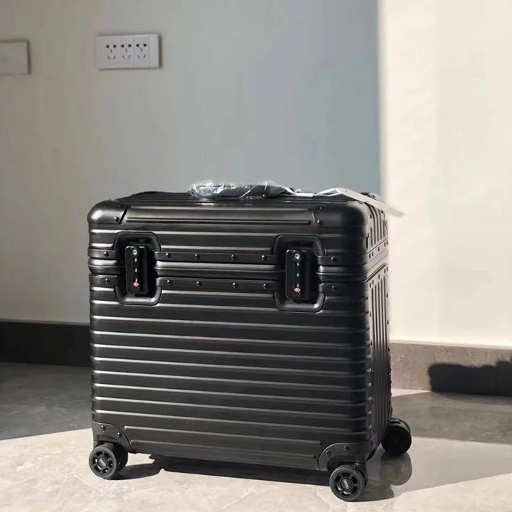 Stilvoller grauer Aluminiumkoffer Monaco; robuster Hartschalen-Trolley mit reisefreundlichem TSA-Schloss.