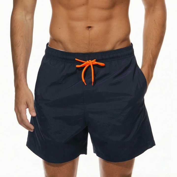 Sportliche Herren Badeshorts, schnelltrocknend und strapazierfähig für Schwimmen und Strandaktivitäten.