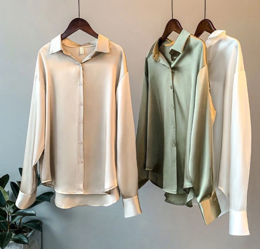 Grüne elegante Langarm Bluse für Damen. Vielseitig tragbar, glänzend und stilvoll im Sommer.