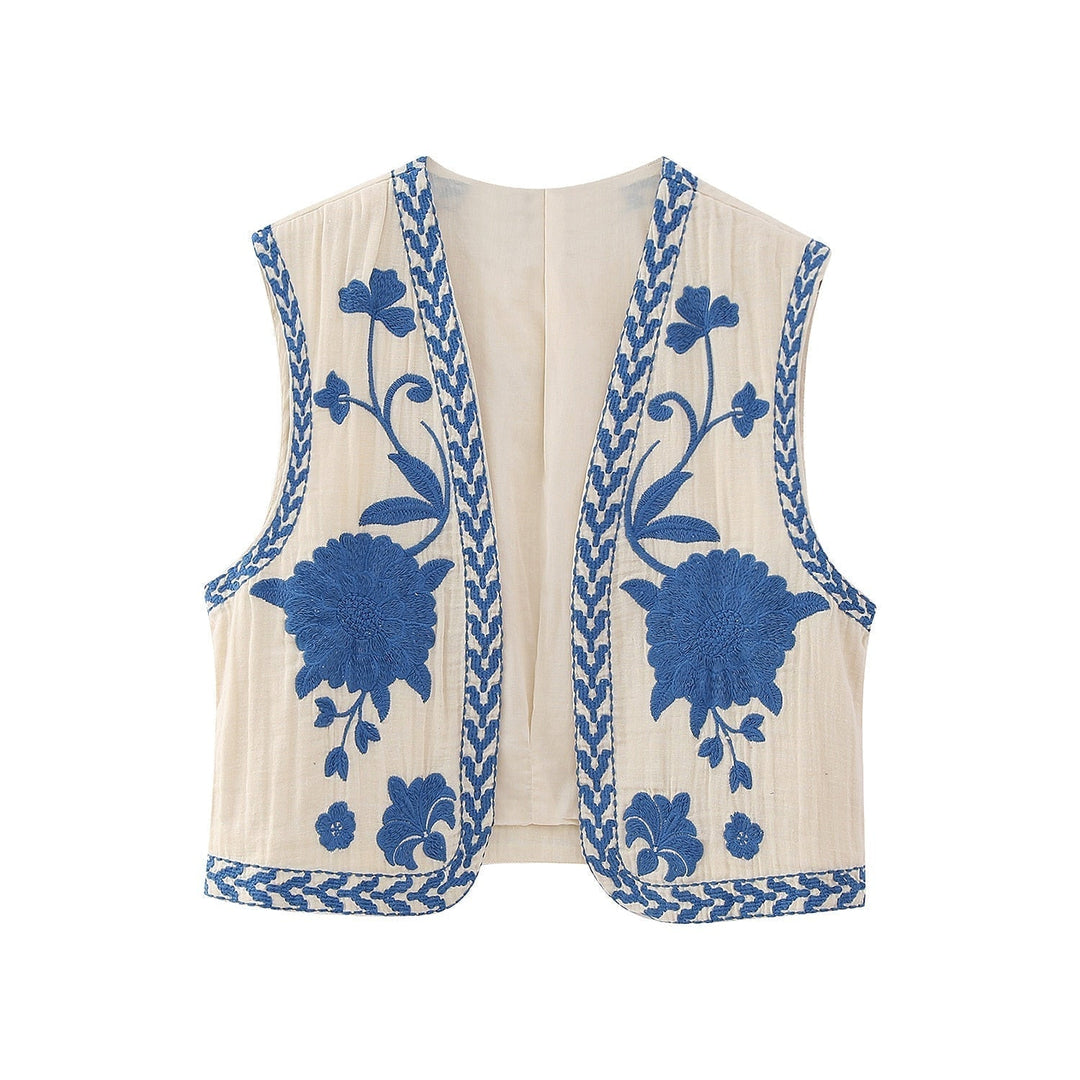 Detailaufnahme der Vintage Damen Weste, elegant mit feiner Blumenstickerei für einen stilvollen Auftritt.