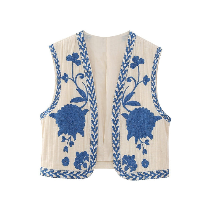 Detailaufnahme der Vintage Damen Weste, elegant mit feiner Blumenstickerei für einen stilvollen Auftritt.