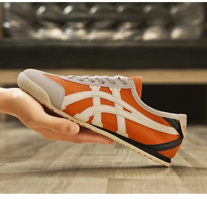 Stylischer Damen- & Herren-Sneaker mit geometrischem Muster; idealer Alltagsschuh für den Sommer.